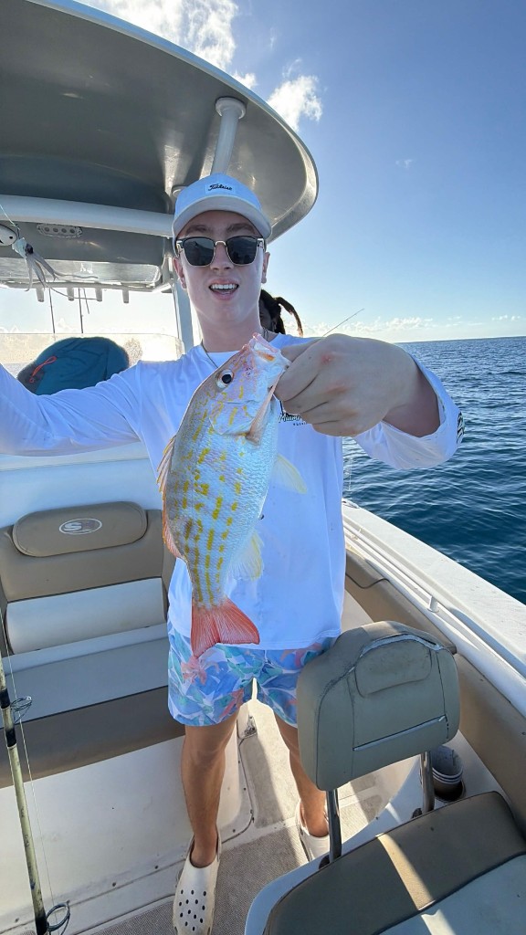 Joe Brennan with a catch on the water